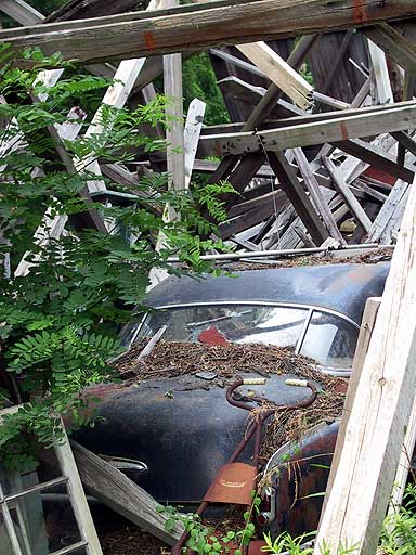 Dilapidated barn and the final resting spot of an old Chevy.jpg